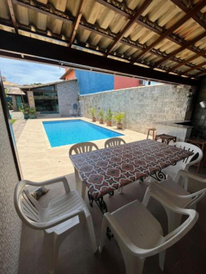 Casa plana, completa, perto de tudo